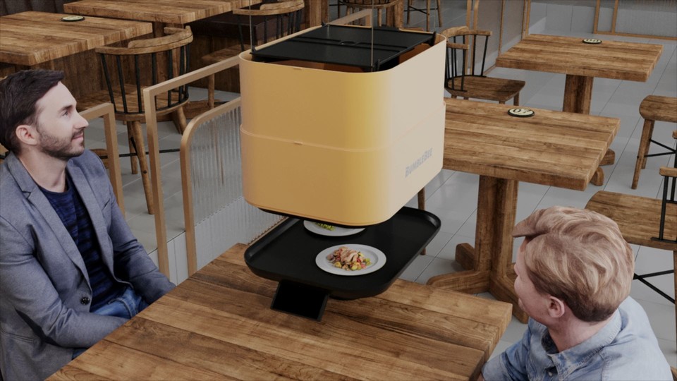 범블비가 천장에서 이동하면서 테이블에 음식을 서빙하고 있다(사진=택트레이서)